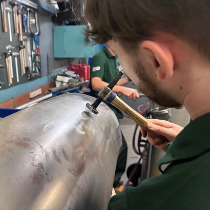 Action photo of panel beating tools 